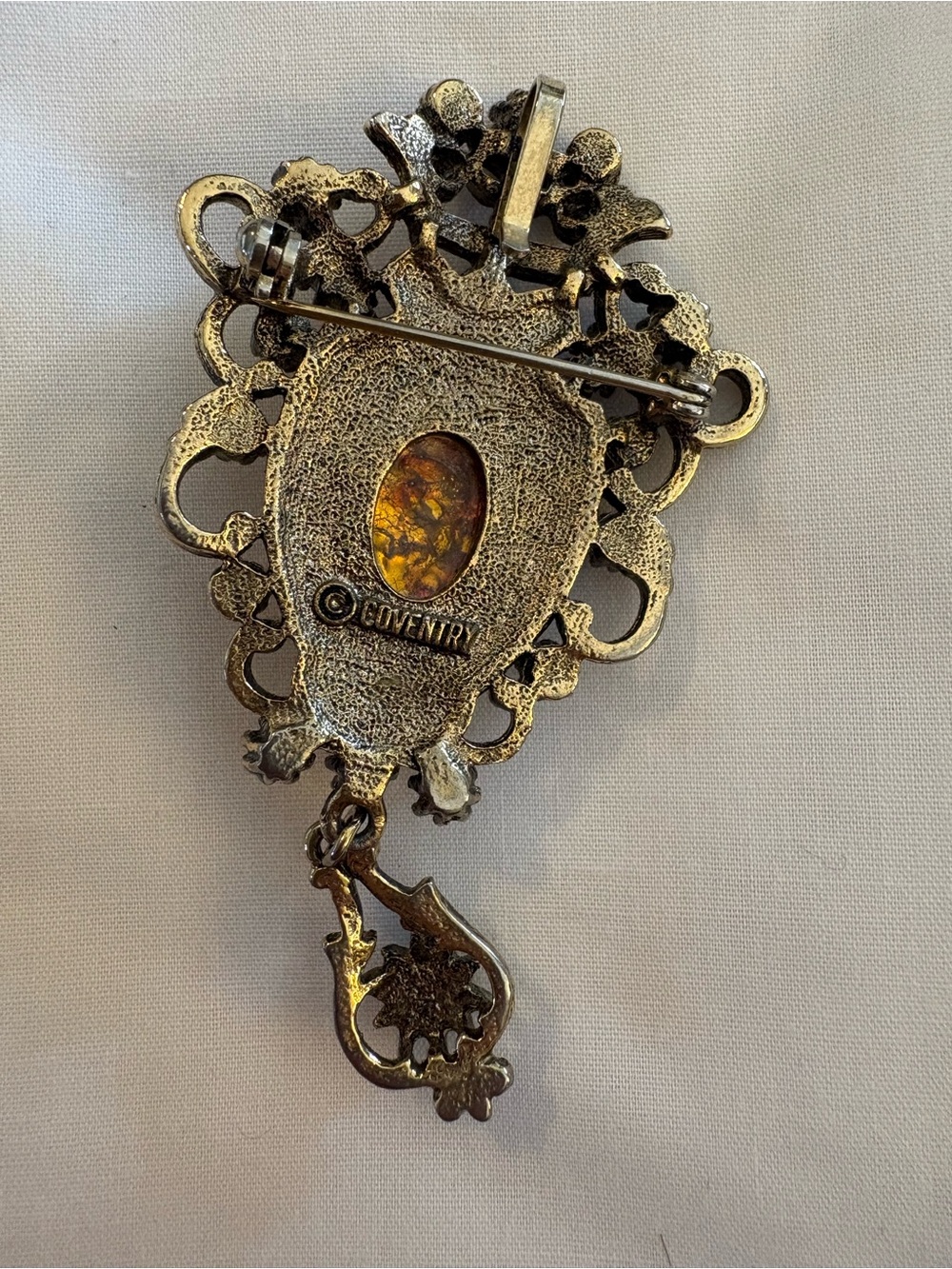 Entry Antique-Style Silver and Amber-Tone Filigree Brooch with Dangle